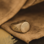 Round Signet ring with matt finish and hallmarks by Jane Cooper