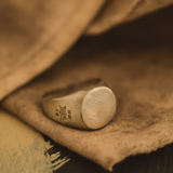Round Signet ring with matt finish and hallmarks by Jane Cooper
