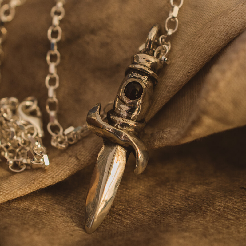 silver dagger pendant set with Garnet stone by Jane Cooper from Speedshop BBC2